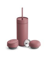 Fellow Carter 3-in-1 Lid System matte pink mug with straw and two containers on white background.