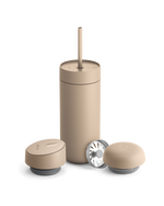 Fellow Carter 3-in-1 Lid System: beige mug with straw, two lids, and metal filter.