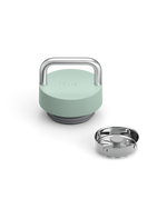 Fellow The Carry Lid in mint green with metal handle, shown beside removable metal strainer.