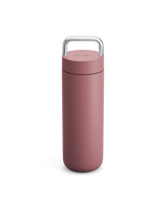 Fellow Carter Carry Travel Mug in Desert Rose, upright with silver handle on white background.