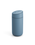 Fellow Carter Slide Mug in matte blue with rounded shape and matching lid, on white background.