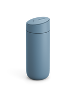 The Fellow Carter Slide Mug is a matte blue travel mug with a rounded lid, shown on white.