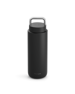 The Fellow Carter Carry Travel Mug is matte black with a silver handle and logo at the bottom.