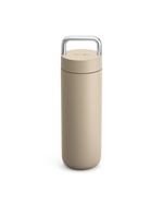 Fellow Carter Carry Travel Mug in Sand Dune with silver handle on a white background.