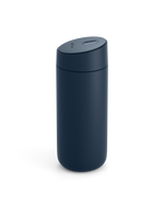 The Fellow Carter Slide Mug is dark blue with a matte finish and a rounded, spill-proof lid.