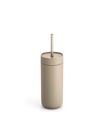 Fellow Carter Cold Tumbler in beige with lid and straw shown on a white background.