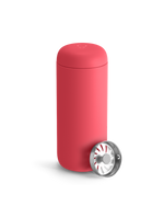 The Fellow Carter Move Mug in Coral Crush keeps your coffee hot and spill-free on the go.