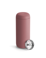 Fellow Carter Move Mug—matte pink with metal strainer, ideal travel mug on white background.