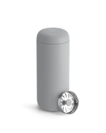 A matte gray Fellow Carter Move Mug with removable strainer on a white background.